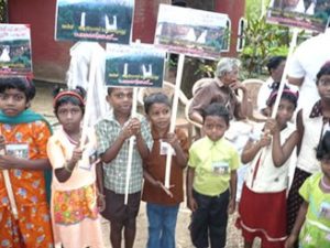 Kadar children engage in a standing protest of the proposed Athirappilly Dam on the Chalakudi River (Photo was from International Rivers with a Creative Commons license)