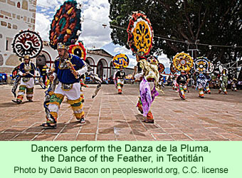 Dancers perform the Dance of the Feather