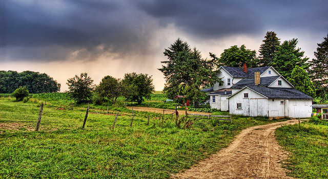 Amish home in Pennsylvania with a summer storm approaching