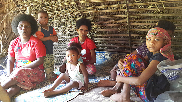 While the Batek men hunt, the women stay home and care for the children.