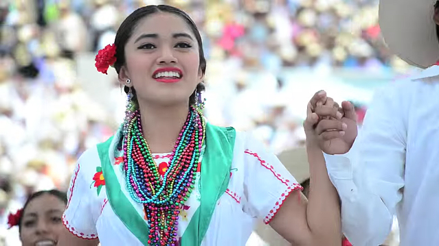 A participant dances during the 2015 Guelaguetza celebration in Oaxaca 