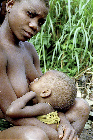 Mbuti mother and her baby 
