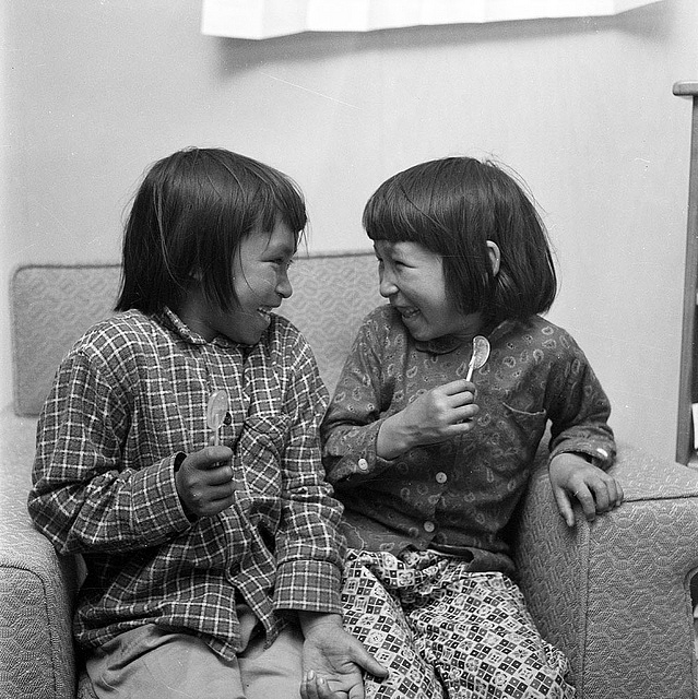 Two Inuit girls enjoying being together