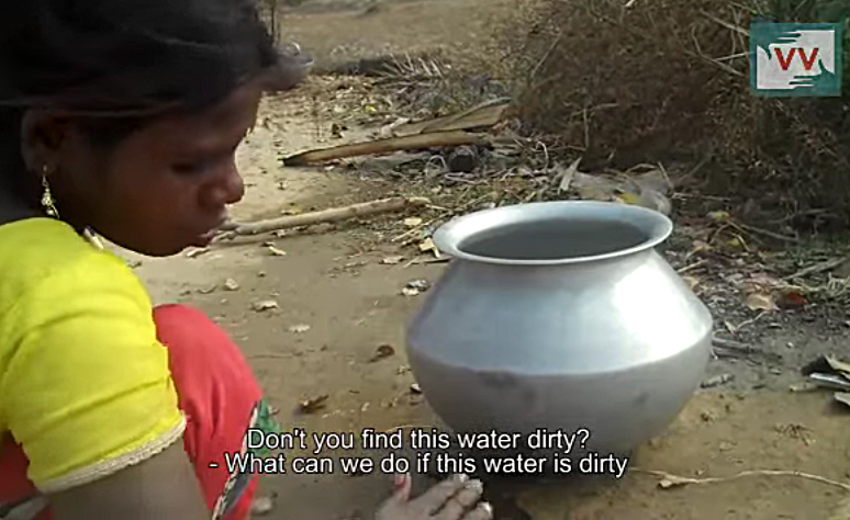 Birhor woman being interviewed about the polluted water in their Jharkhand village 