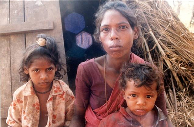 A Paliyan woman with her kids in the Sirumalai Hills of Tamil Nadu