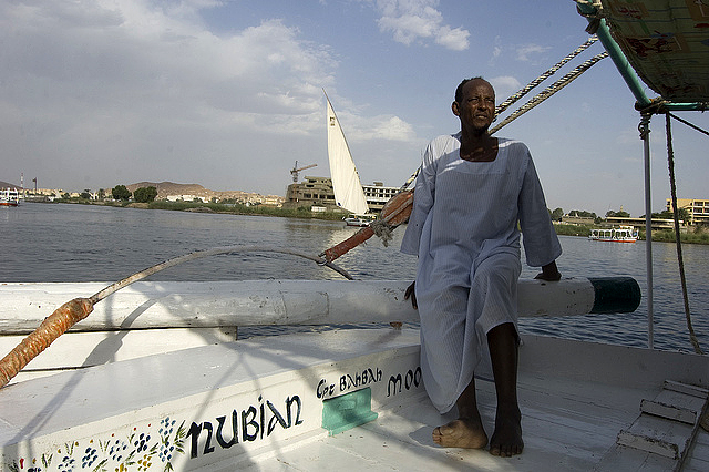 A Nubian felucca captain works for tourists at Aswan (Photo by Katie Hunt on Flickr, Creative Commons license)