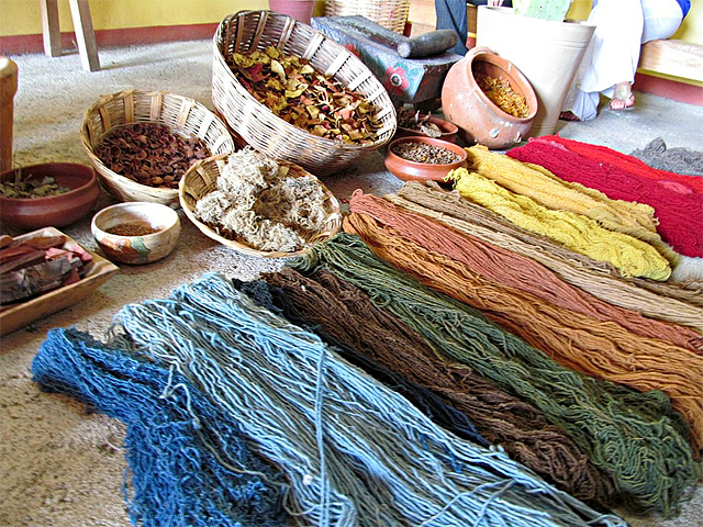 Wool spun and dyed with dried fruits and insects 