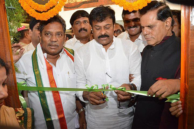 Chiranjeevi plays the role of politician, center, cutting a ribbon on July 17, 2014 