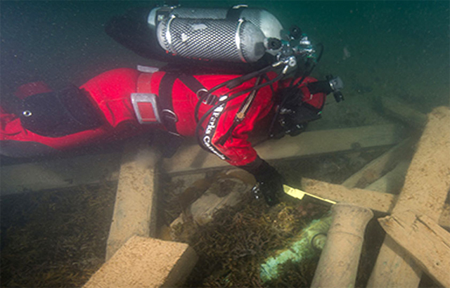 An underwater archaeologist at work