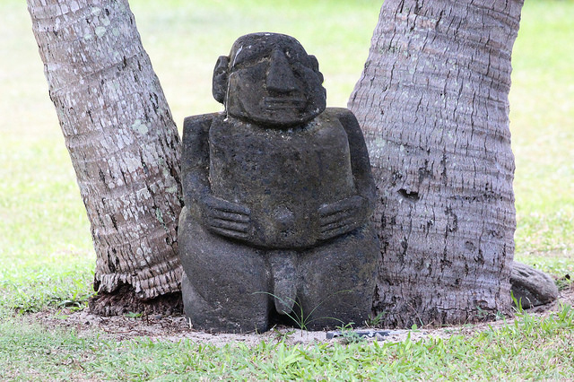 A stone carving of an ancient Tahitian man on Moorea 