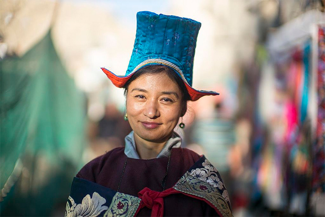 A Ladakhi woman wearing a traditional hat