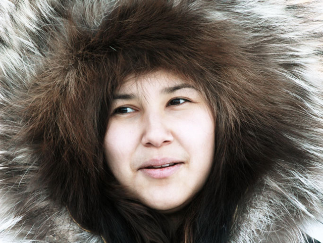 A portrait of a young Inuit woman 
