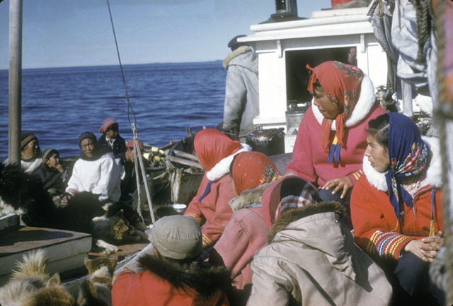 A group of Labrador people on a boat heading for the fishing grounds in the 1960s 