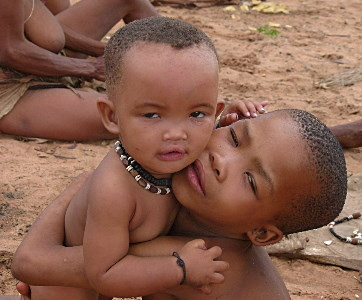 A couple kids at a traditional San village in northern Namiba 