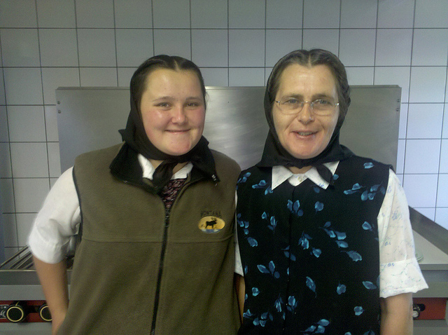 Two Hutterite women at the King Colony in Montana who host overnight visitors, such as the photographer who noted that they were “very friendly and welcoming” 