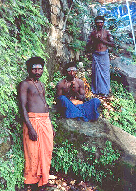 Paliyan men at a Murugan temple 