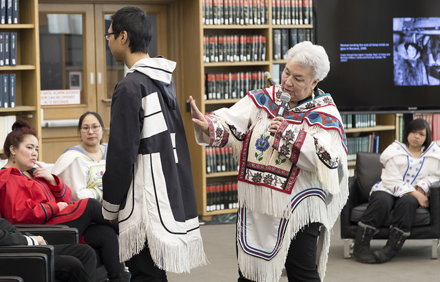 Elder Manitok Thompson explains the significance of certain features of a parka 