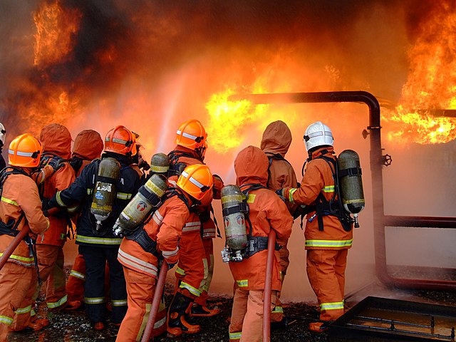 Firefighters in Malaysia practicing at a training facility 